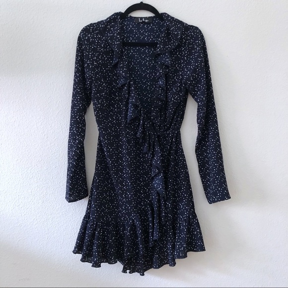 Lulus Dresses & Skirts - Lulu’s polka dot ruffled wrap mini dress